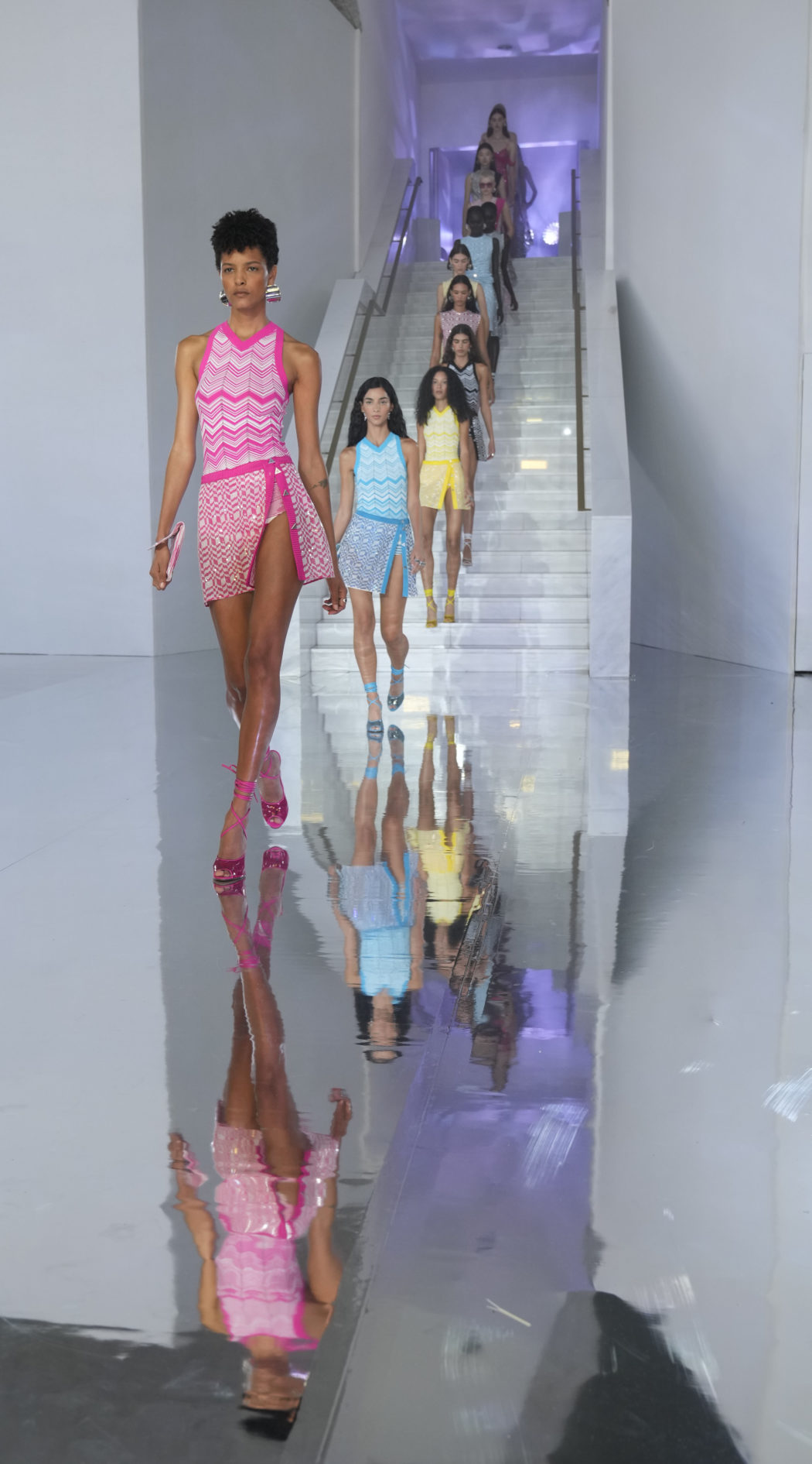 Models wears creations as part of the Missoni women’s Spring Summer 2023 collection presented in Milan, Italy, Friday, Sept. 23, 2022. (AP Photo/Antonio Calanni)