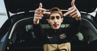 Copertina di “Baby Gang era sotto regime di sorveglianza speciale, ma riuscì di nascosto ad arrivare in Iraq per un video coi bazooka, mitra e kalashnikov”: i dettagli dell’ordinanza per il trapper arrestato