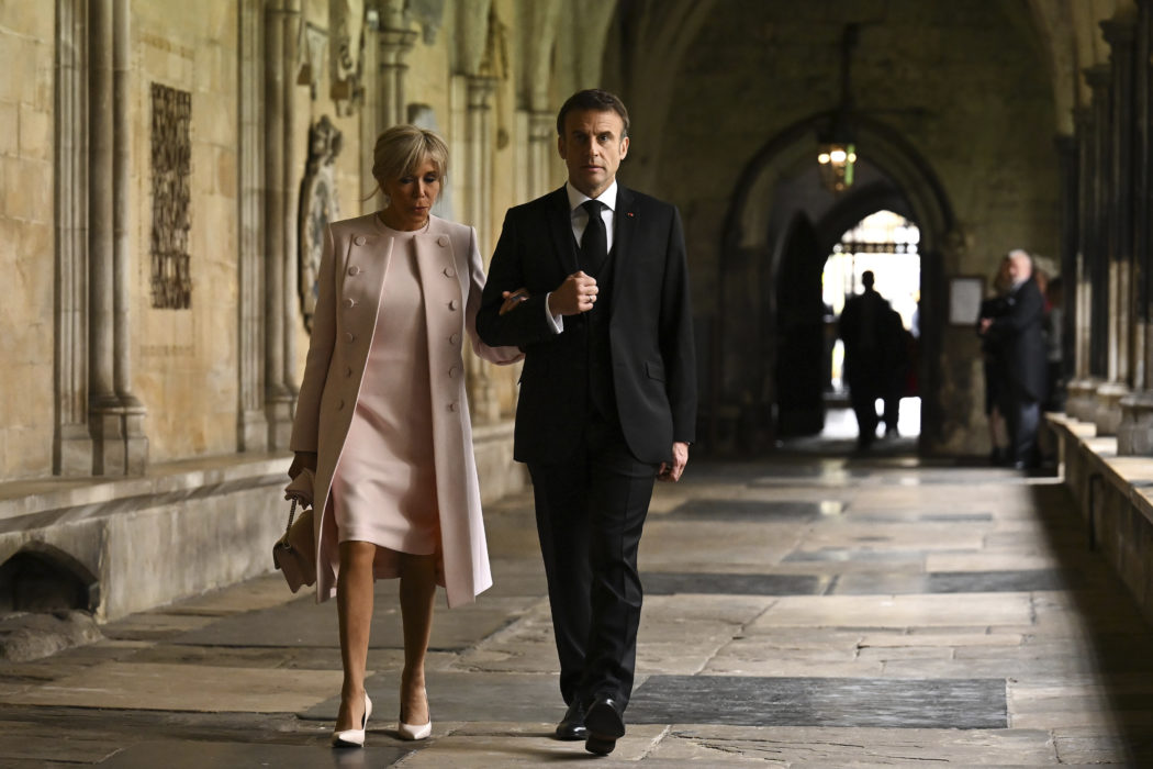 French President Emmanuel Macron and French President’s wife Brigitte Macron arrive to take their seats inside Westminster Abbey in central London Saturday, May 6, 2023, ahead of the coronations of Britain’s King Charles III and Britain’s Camilla, Queen Consort. The set-piece coronation is the first in Britain in 70 years, and only the second in history to be televised. Charles will be the 40th reigning monarch to be crowned at the central London church since King William I in 1066. (Ben Stansall/POOL photo via AP)