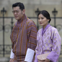 Bhutan’s King Jigme Kesar Namgyel Wangchuck and Queen Jetsun Pema Wangchuck arrive ahead of the coronation of King Charles III and Camilla, the Queen Consort, in London, Saturday, May 6, 2023. (AP Photo/Kin Cheung)