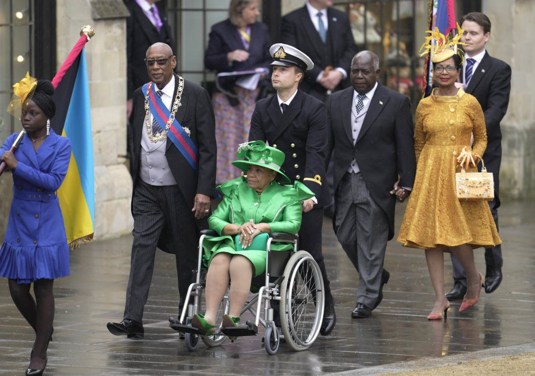 Dignitaries arrive ahead of the coronation of King Charles III and Camilla, the Queen Consort, in London, Saturday, May 6, 2023. (AP Photo/Kin Cheung)