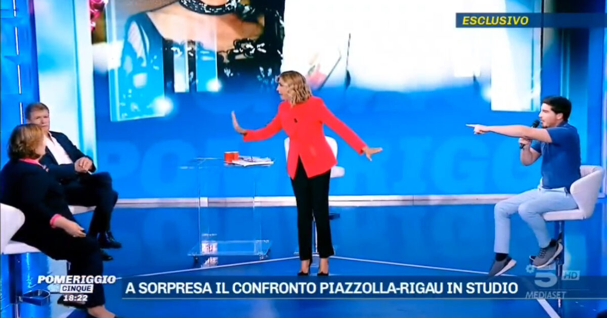 Pomeriggio 5, scoppia la rissa in diretta per l’eredità di Gina Lollobrigida tra Rigau e Piazzolla e volano minacce di morte: “Bandito, ti ammazzo”