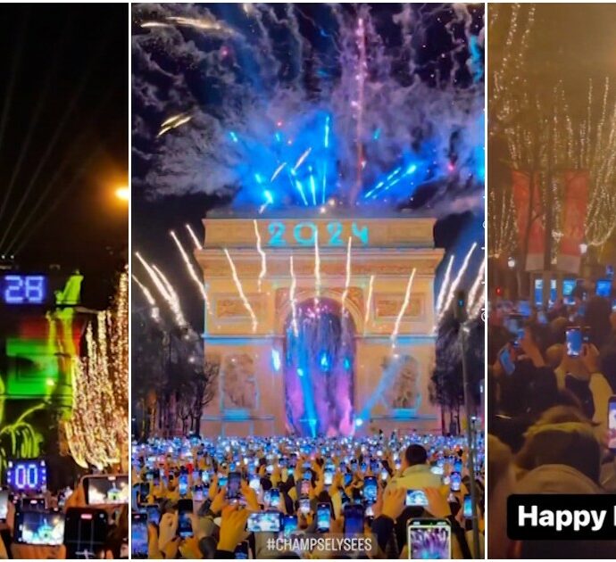 Capodanno a Parigi, migliaia di persone con lo smartphone alzato sugli Champs-Élysées: il colpo d’occhio è impressionante