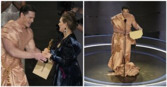 Copertina di Oscar 2024, John Cena nudo sul palco per annunciare la statuetta per i Migliori Costumi: il conduttore lo copre con una tenda – VIDEO