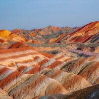 The beautiful colorful rock in Zhangye Danxia geopark of China during the sunset with blue sky and copy space for text
