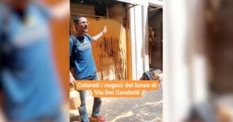 Copertina di Blitz di Ultima generazione in via Condotti a Roma: vernice arancione sulle vetrine dei negozi di lusso