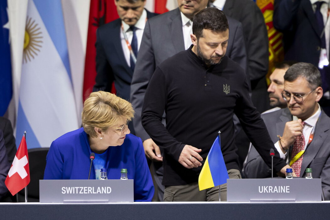 epa11412733 Swiss Federal President Viola Amherd (L) and Ukrainian President Volodymyr Zelensky (R) take their places prior to the opening plenary session of the Summit on Peace in Ukraine, in Stansstad near Lucerne, Switzerland, 15 June 2024. International heads of state gather on 15 and 16 June at the Buergenstock Resort in central Switzerland for the two-day Summit on Peace in Ukraine.  EPA/MICHAEL BUHOLZER / POOL            EDITORIAL USE ONLY  EDITORIAL USE ONLY