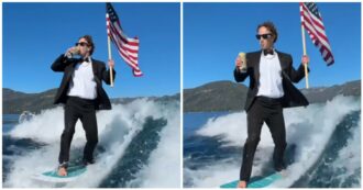 Copertina di Mark Zuckerberg surfa con lo smoking mentre beve birra e tiene in mano la bandiera Usa: il video per il 4 luglio è virale e interviene Elon Musk