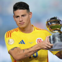Colombia’s James Rodriguez holds the player of the tournament trophy after the Copa America final soccer match in Miami Gardens, Fla., Monday, July 15, 2024. Argentina defeated Colombia 1-0. (AP Photo/Julio Cortez)