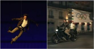 Copertina di Olimpiadi, Tom Cruise show a Parigi: si lancia dal tetto dello stadio e sfreccia in moto per il passaggio del testimone a LA 2028