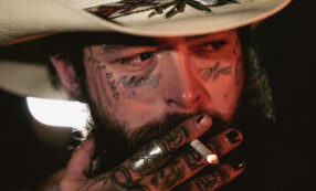 Copertina di “Quando la accompagnerò all’altare, farò quello che devono fare i papà”: Post Malone pazzo della figlia immagina il suo matrimonio in salsa country