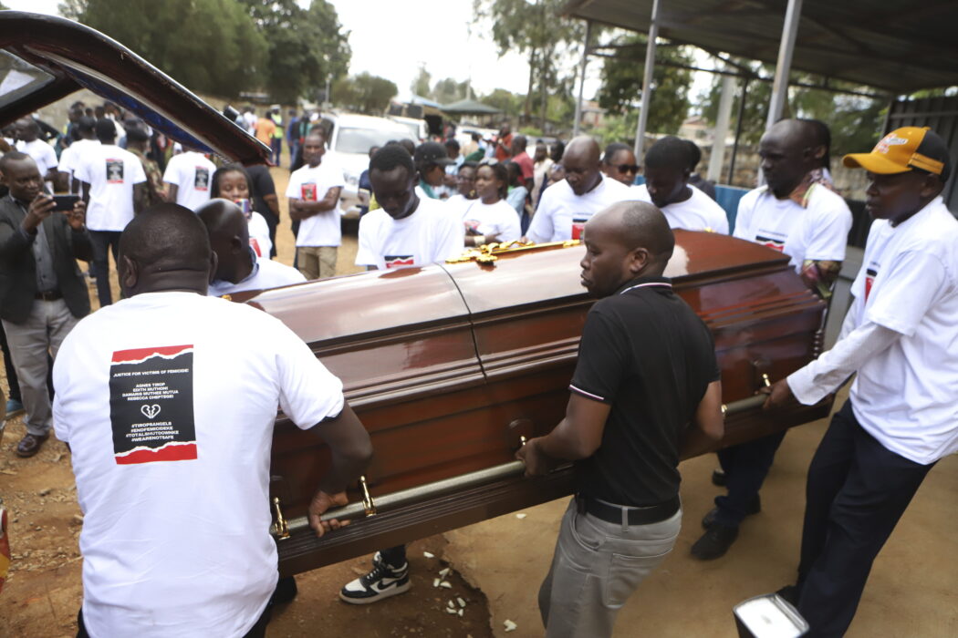 Relatives and friends carry the casket of Ugandan Olympic athlete Rebecca Cheptegei outside Moi Teaching and Referral Hospital morgue in the western city of Eldoret, in Rift Valley, Kenya Friday, Sept. 13, 2024. (AP Photo/Andrew Kasuku)