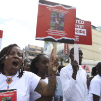 Activists and relatives of Ugandan Olympic athlete Rebecca Cheptegei march calling for an end to femicide in the western city of Eldoret, in Rift Valley, Kenya Friday, Sept. 13, 2024. (AP Photo/Andrew Kasuku)