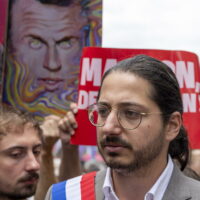 epa11617504 Member of Parliament for the left-wing party La France Insoumise (LFI) Aurelien Le Coq joins protesters during a demonstration against the new Prime minister and French President Emmanuel Macron, in Paris, France, 21 September 2024. Newly appointed French Prime Minister Michel Barnier communicated the list of names of his proposed government to the French President Emmanuel Macron on 20 September. The approval of this list is expected to be in the next few days. The French left parties coalition, Nouveau Front Populaire (NFP), which had arrived ahead in the last legislative elections but fell short of a full majority, called for rallies on 21 September, as they say that their win was not taken in consideration in the formation of the new cabinet.  EPA/ANDRE PAIN