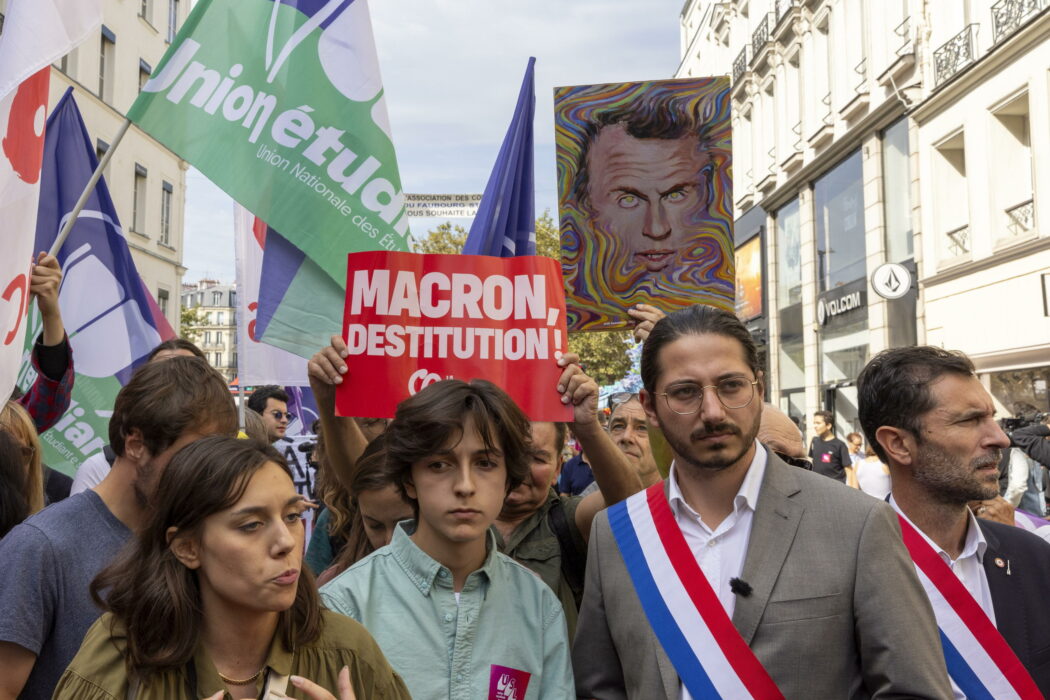 epa11617501 Member of Parliament for the left-wing party La France Insoumise (LFI) Aurelien Le Coq  (2-R) joins protesters during a demonstration against the new Prime minister and French President Emmanuel Macron, in Paris, France, 21 September 2024. Newly appointed French Prime Minister Michel Barnier communicated the list of names of his proposed government to the French President Emmanuel Macron on 20 September. The approval of this list is expected to be in the next few days. The French left parties coalition, Nouveau Front Populaire (NFP), which had arrived ahead in the last legislative elections but fell short of a full majority, called for rallies on 21 September, as they say that their win was not taken in consideration in the formation of the new cabinet.  EPA/ANDRE PAIN