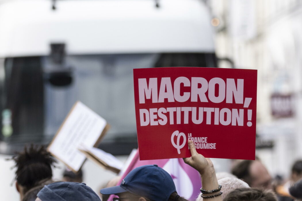 epa11617505 Protesters demonstrate against the Prime Minister Michel Barnier and ask for the destitution of French President Emmanuel Macron, in Paris, France, 21 September 2024. Newly appointed French Prime Minister Michel Barnier communicated the list of names of his proposed government to the French President Emmanuel Macron on 20 September. The approval of this list is expected to be in the next few days. The French left parties coalition, Nouveau Front Populaire (NFP), which had arrived ahead in the last legislative elections but fell short of a full majority, called for rallies on 21 September, as they say that their win was not taken in consideration in the formation of the new cabinet.  EPA/ANDRE PAIN