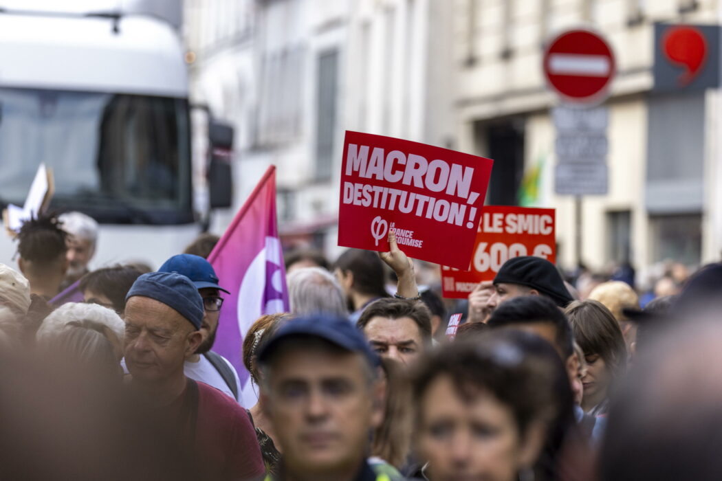 epa11617508 Protesters demonstrate against the Prime Minister Michel Barnier and ask for the destitution of French President Emmanuel Macron, in Paris, France, 21 September 2024. Newly appointed French Prime Minister Michel Barnier communicated the list of names of his proposed government to the French President Emmanuel Macron on 20 September. The approval of this list is expected to be in the next few days. The French left parties coalition, Nouveau Front Populaire (NFP), which had arrived ahead in the last legislative elections but fell short of a full majority, called for rallies on 21 September, as they say that their win was not taken in consideration in the formation of the new cabinet.  EPA/ANDRE PAIN