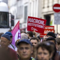 epa11617508 Protesters demonstrate against the Prime Minister Michel Barnier and ask for the destitution of French President Emmanuel Macron, in Paris, France, 21 September 2024. Newly appointed French Prime Minister Michel Barnier communicated the list of names of his proposed government to the French President Emmanuel Macron on 20 September. The approval of this list is expected to be in the next few days. The French left parties coalition, Nouveau Front Populaire (NFP), which had arrived ahead in the last legislative elections but fell short of a full majority, called for rallies on 21 September, as they say that their win was not taken in consideration in the formation of the new cabinet.  EPA/ANDRE PAIN