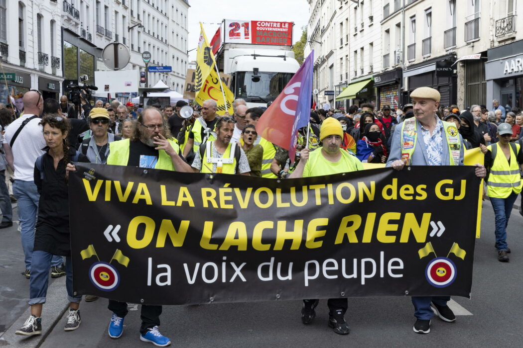 epa11617509 Protesters demonstrate against the Prime Minister Michel Barnier and ask for the destitution of French President Emmanuel Macron, in Paris, France, 21 September 2024. Newly appointed French Prime Minister Michel Barnier communicated the list of names of his proposed government to the French President Emmanuel Macron on 20 September. The approval of this list is expected to be in the next few days. The French left parties coalition, Nouveau Front Populaire (NFP), which had arrived ahead in the last legislative elections but fell short of a full majority, called for rallies on 21 September, as they say that their win was not taken in consideration in the formation of the new cabinet.  EPA/ANDRE PAIN