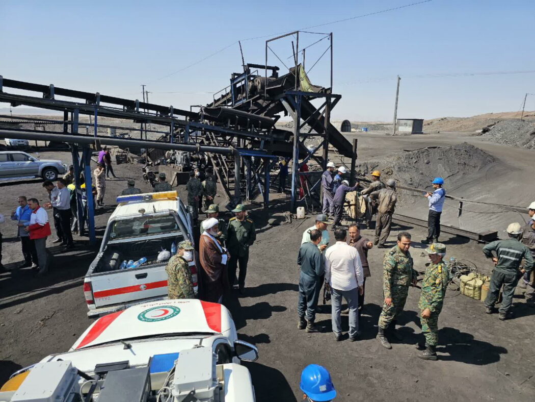 epa11618515 A handout photo made available by the Iranian Red Crescent Society (IRCS) shows Iranian rescue and security forces gathered around a coal mine in Tabas, Khorasan province in southeastern Iran, 22 September 2024. Iranian state media, citing the governor of South Khorasan province, reported that a methane leak at a coal mine in Tabas, eastern Iran, caused an explosion that resulted in at least 30 workers dying, 17 injured, and others missing.  EPA/IRANIAN RED CRESCENT SOCIETY / HANDOUT HANDOUT EDITORIAL USE ONLY/NO SALES