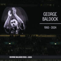 A portrait of George Baldock is shown on the screen before the UEFA Nations League Group F soccer match between England and Greece at Wembley Stadium in London, Thursday, Oct. 10, 2024. England-born Greece international and Panathinaikos defender George Baldock, who had previously played for Sheffield United, has been found dead in his Athens home on Wednesday. (AP Photo/Kirsty Wigglesworth)

Associated Press/LaPresse