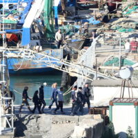 epa11661889 A group of migrants intercepted in Italian waters arrive aboard an Italian navy boat at Shengjin, Albania, 16 October 2024. Italy has begun sending migrants rescued in the Mediterranean to detention centers in Albania, where their asylum claims will be processed. The plan, finalized in February 2024, allows Italy to transfer up to 36,000 asylum seekers to Albania annually, with the goal of deterring migrants from attempting to reach Italy. While the Italian government and some EU leaders support the program, human rights groups criticize it for potentially putting migrants at risk and exposing them to rights violations.  EPA/MALTON DIBRA