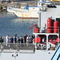 epa11661888 A group of migrants intercepted in Italian waters arrive aboard an Italian navy boat at Shengjin, Albania, 16 October 2024. Italy has begun sending migrants rescued in the Mediterranean to detention centers in Albania, where their asylum claims will be processed. The plan, finalized in February 2024, allows Italy to transfer up to 36,000 asylum seekers to Albania annually, with the goal of deterring migrants from attempting to reach Italy. While the Italian government and some EU leaders support the program, human rights groups criticize it for potentially putting migrants at risk and exposing them to rights violations.  EPA/MALTON DIBRA