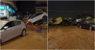 Copertina di Alluvione a Valencia, la camminata tra le strade del disastro: lo scenario post-apocalittico tra auto distrutte e quartieri senza luce