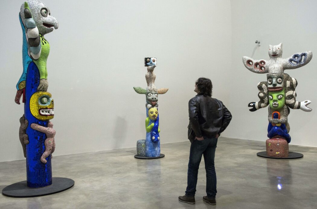 A man looks at sculptures displayed during a preview of a retrospective exhibition on French-US artist Niki de Saint Phalle (1930-2002) at the Guggenheim Museum in Bilbao city, Basque Country, northern Spain, 26 February 2015. The retrospective, the first major exhibition devoted to De Saint Phalle in twenty years, runs from 27 February to 11 June 2015. EFE/Miguel Tona