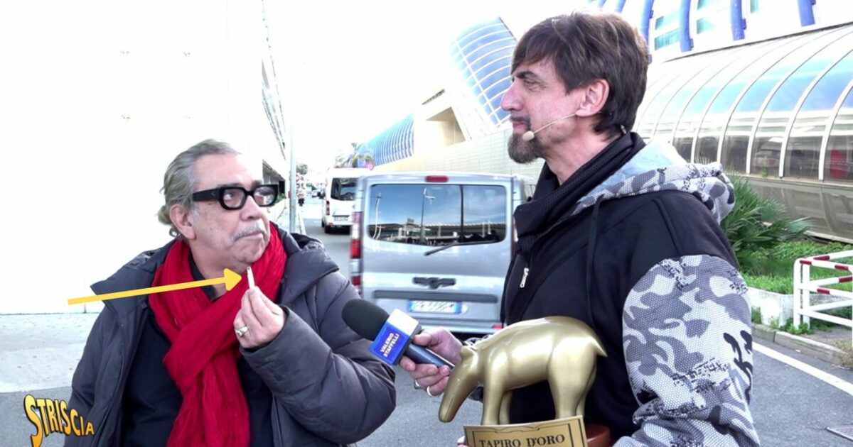 Guillermo Mariotto furioso spacca in mille pezzi il Tapiro d’Oro di Striscia la Notizia e minaccia Staffelli: “Questa sigaretta va a finire in un posto…”