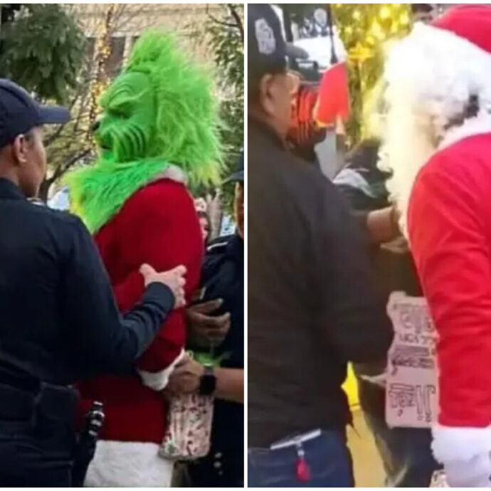 Babbo Natale e Grinch si azzuffano per strada e vengono arrestati: la scena ripresa dai passanti diventa virale sui social – VIDEO