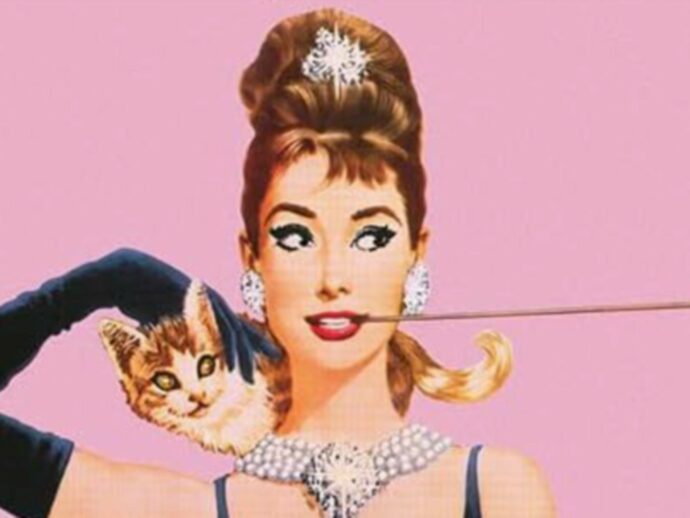 Addio a McGinnis. Sue le locandine di 007 e Hepburn