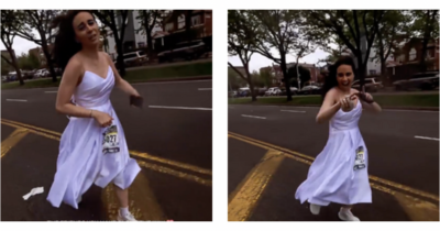 Copertina di Corre per le strade di New York in abito da sposa ma non sta scappando, anzi: “Nel mio cartello attaccato sul sedere c’è scritto ‘piena di speranza’”