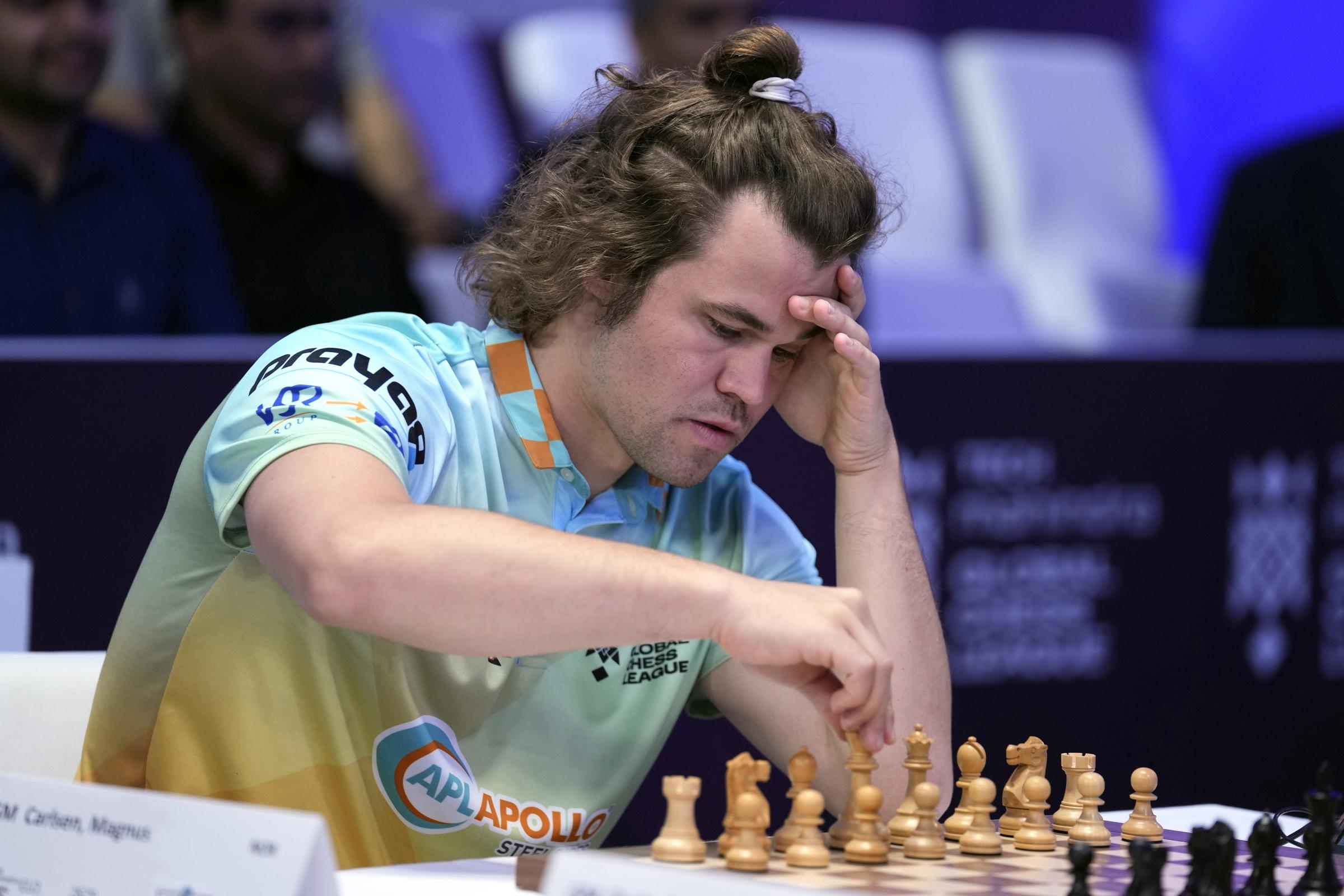 il mondo ferma magnus carlsen la leggenda degli scacchi costretta alla patta in una partita epica contro 143mila persone