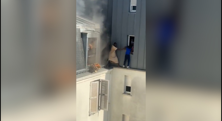 parigi esce sul cornicione e salva un8217intera famiglia da un incendio premiato dalla polizia il video