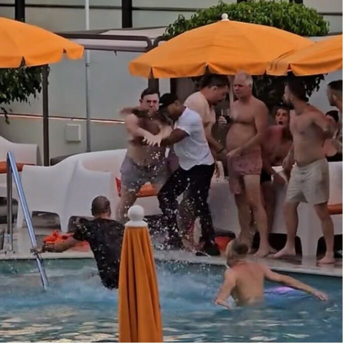 Pugni, calci e uomini gettati in piscina: scoppia una maxi rissa a bordo piscina durante l’addio al celibato, il video è virale su TikTok