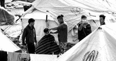 Copertina di Migranti nei lager invisibili ai turisti