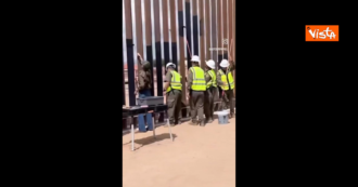 Copertina di Trump ordina di verniciare di nero il muro tra Usa e Messico per renderlo incandescente. E la “sua” segretaria fa il video durante i lavori