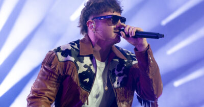 Copertina di Sudore, carisma, baffo sexy: Olly a Milano diventa grande e dopo club e Ippodromo annuncia il primo stadio a Genova. Sul palco a sorpresa Emma e Nigiotti