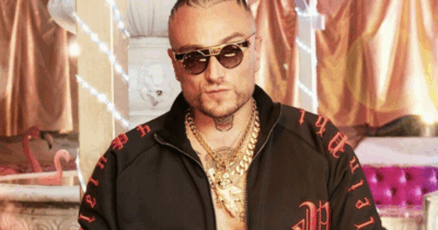 Copertina di “Rapper da classifica che non ti esponi, fai come me. Dona, manda il grano”: Gue’ risponde alle accuse di Ghali e mostra le foto delle donazioni pro Gaza