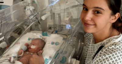 Copertina di “Pensavo di avere un attacco di appendicite e invece ero incinta”: il racconto choc della 26enne Megan Isherwood