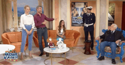 Copertina di “I personaggi che si occupano del programma devono stare tutti qua in studio. Chiamate l’arredatrice!”: Michele Guardì sbotta a “I Fatti Vostri”