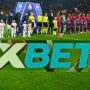 Copertina di In Italia è vietato scommetterci, ma è sponsor della Serie A: il nuovo caso del bookmaker 1Xbet