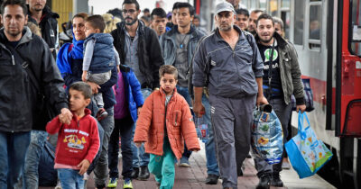 Copertina di Migranti, la Germania pensa di portarli in Uganda e Kurdistan iracheno. Ma anche nella “sicura” Tunisia