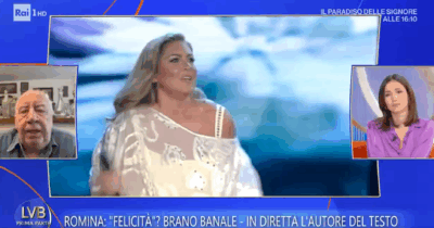 Copertina di “Questo non mi piace! L’hai tirata in mezzo come se la attaccassimo”: Caterina Balivo battibecca con il paroliere Popi Minellono per Romina Power