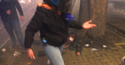 Copertina di “Dobbiamo andare via”: polizia lascia un uomo ferito e sanguinante a terra durante gli scontri a Torino