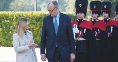 Copertina di Asse Roma-Berlino: il patto per la competitività tra Merz-Meloni è per la “deregulation” delle imprese