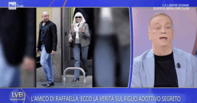 Copertina di “Il figlio adottivo di Raffaella Carrà? Era il suo bodyguard e lei si fidava di lui, poi è diventato l’assistente personale. Gli ha insegnato tutto, anche la riservatezza”: parla l’ufficio stampa Angelo Perrone
