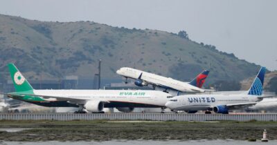 Copertina di L’effetto della guerra di Trump sui voli: costi impazziti e tagli alle rotte