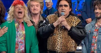 Copertina di “Non so se sono viva: sono l’ologramma di me stessa”: il testo degli Elio sconvolge Milly Carlucci nella finale di Canzonissima